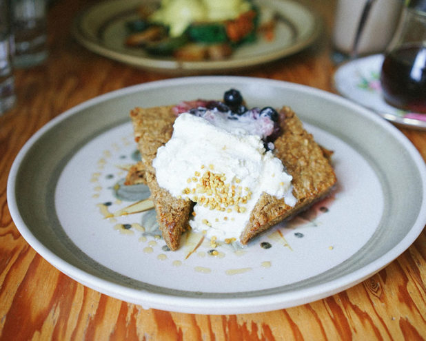 Sleeping Beauty pancakes at Nourish, with melt-in-your-mouth whole oat pancakes, bee pollen sprinkles and seasonal fruit compote. Credit: Nick Bentley