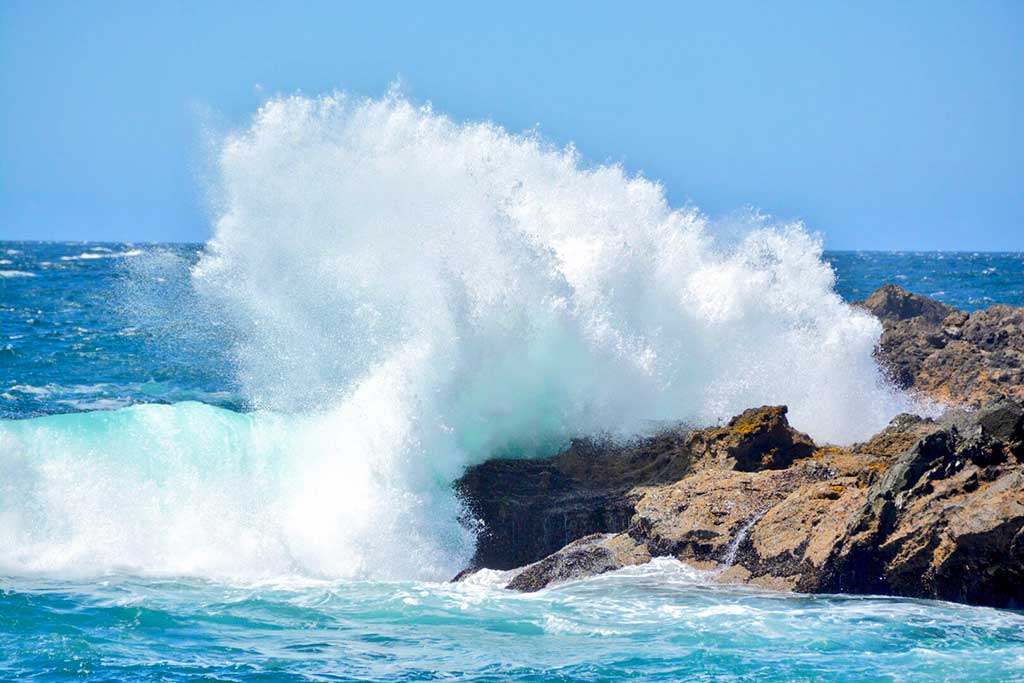 You'll know you're near the end of your journey when you spot the stormy seas of Tofino. Photo: Scott Meis