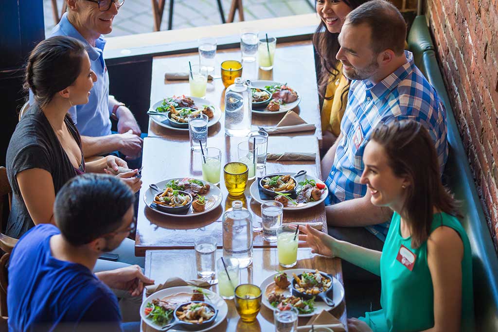 Sample delicious fare with your friends in Gastown. Credit: Vancouver Foodie Tours