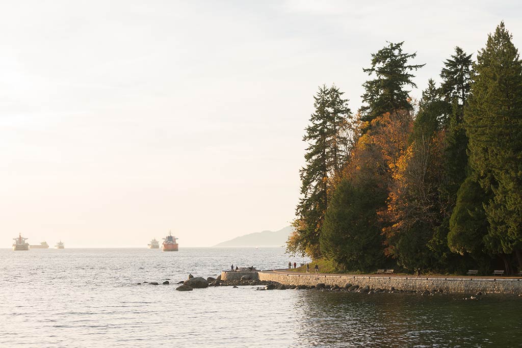 A walk along the Stanley Park Seawall offers stunning views of the region. Credit: Destination BC