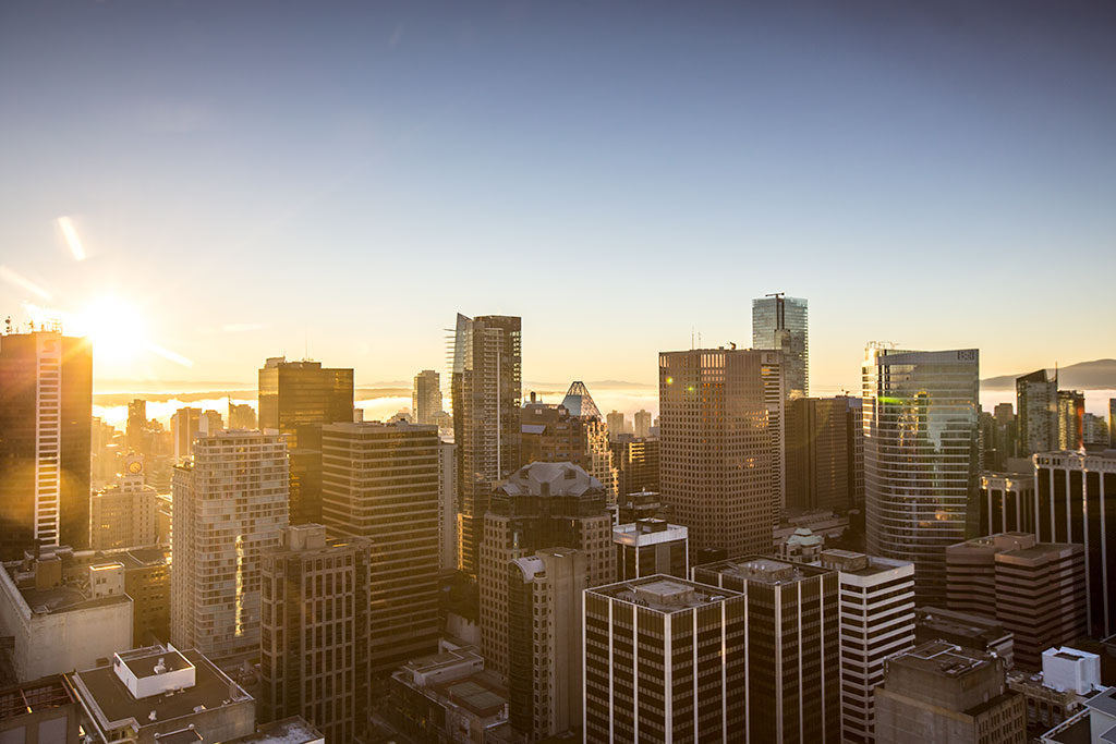 Vancouver's stunning downtown skyline glitters in the sunlight. Credit: Vancouver Outlook