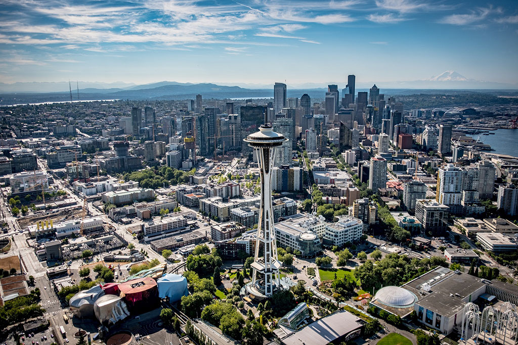 Soar above Seattle's downtown core for a stunning aerial view of the city.