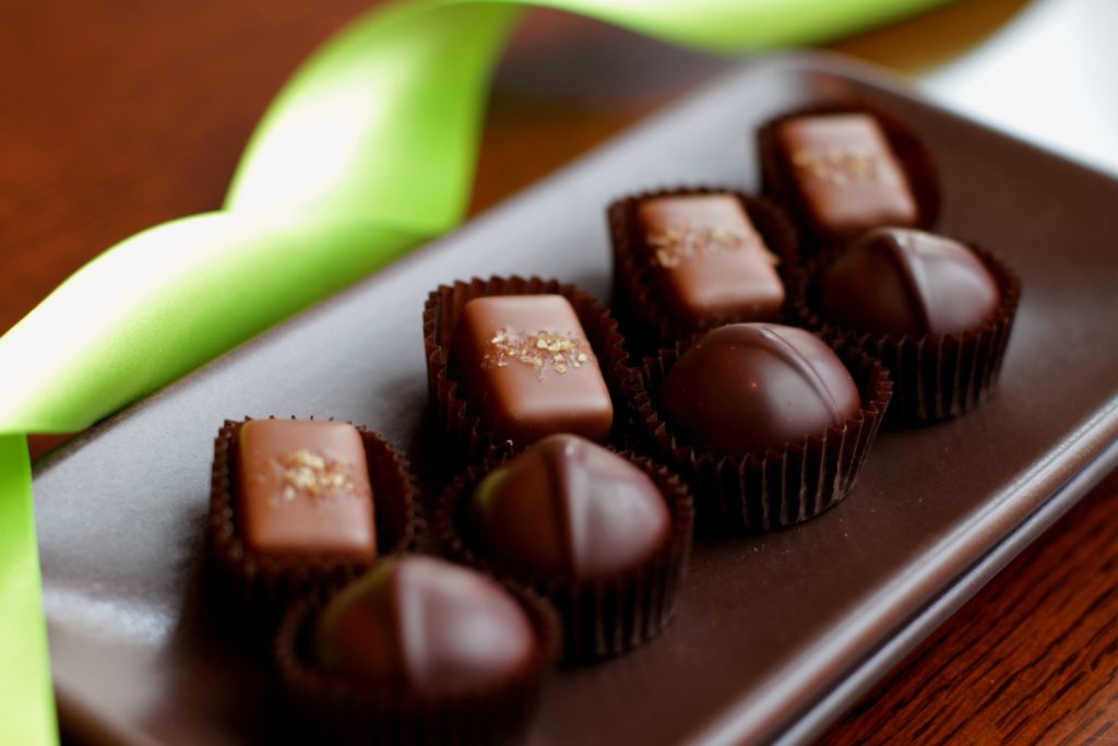 Sample delicious salted caramels (Obama’s favorite chocolates) and dark chocolate truffles from Fran’s Chocolates. Credit: Savor Seattle