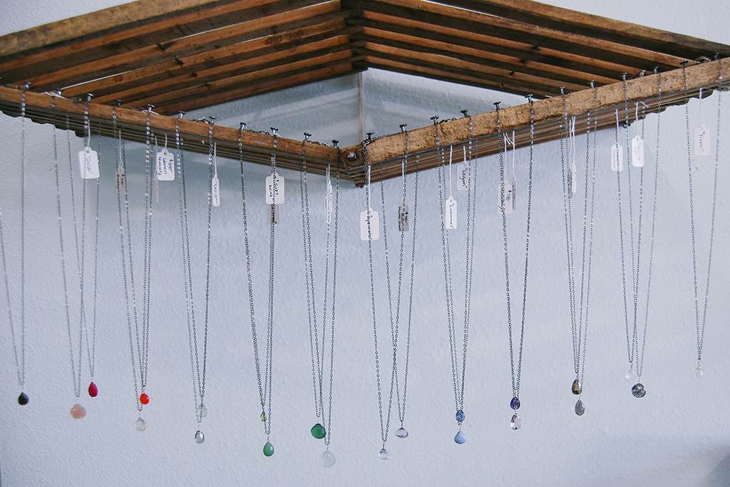 Stunning handcrafted jewelry decks the walls of the Foamy Wader boutique.