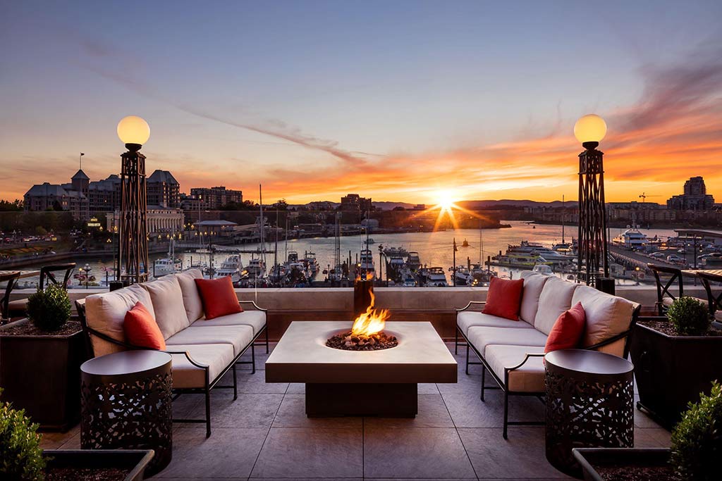 Cuddle up on the Terrace and watch the Inner Harbour fade into the night. Credit: The Fairmont Empress