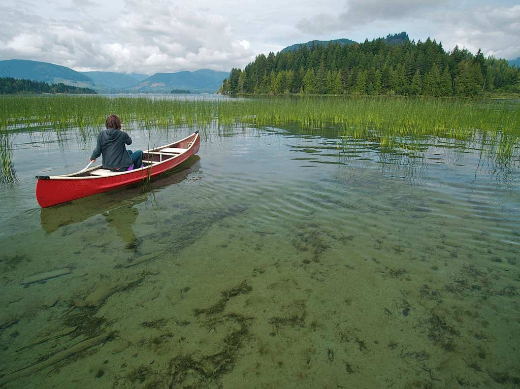 Take time for a stop along the serene waters of Lake Cowichan on the Marine Circle Route. Credit: Dale Simonson