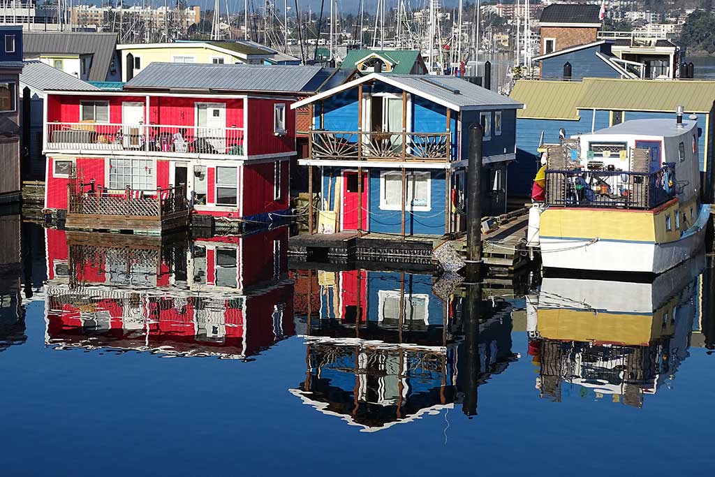 Wander through a colorful collection of floating houseboats along Fisherman's Wharf. Credit: Penny Pitcher