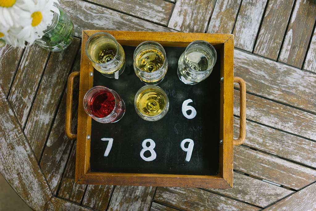 Sip delicious apple beverages at Sea Cider while enjoying views of apple blossoms and the breathtaking Haro Strait below. Credit: Nick Bentley