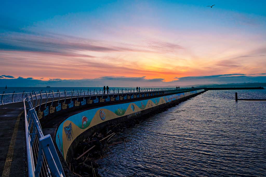 Venture out on the breakwater for breathtaking vistas of the Harbor’s calm waters. Credit: Vadym Graifer