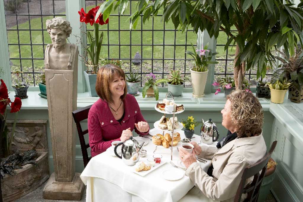 Feast on three-tiers of tasty eats while being surrounded by a variety of gorgeous blooms. Credit: The Butchart Gardens