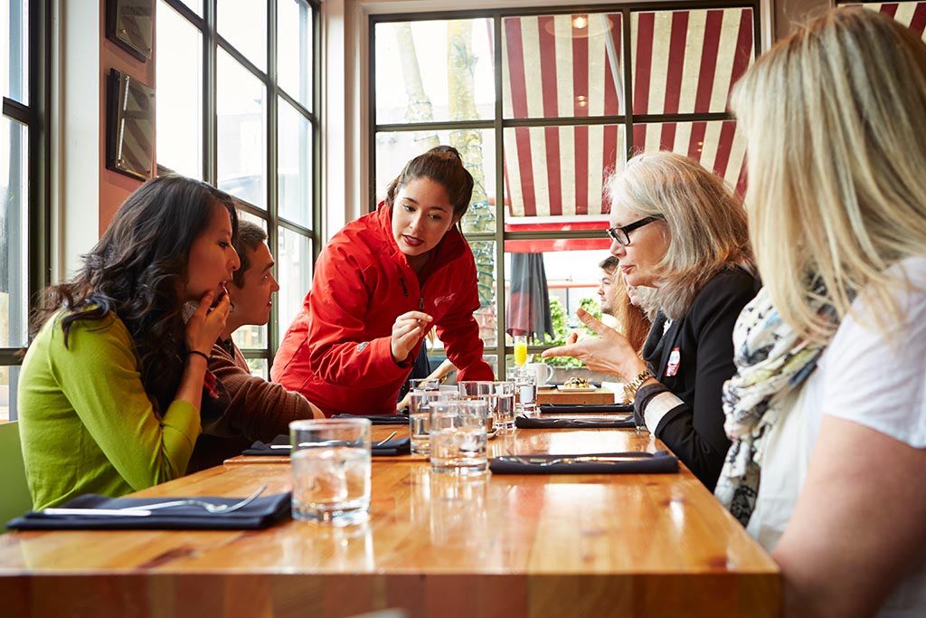 Skip the lines in the bustling Granville Market for more than exclusive tastings on a guided tour. Credit: Vancouver Foodie Tours