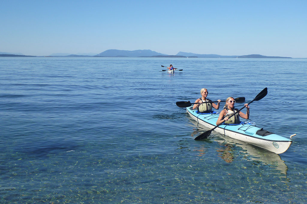 The calm waters of the San Juan Channel are perfect for beginning paddlers. Credit: Ocean River Adventures