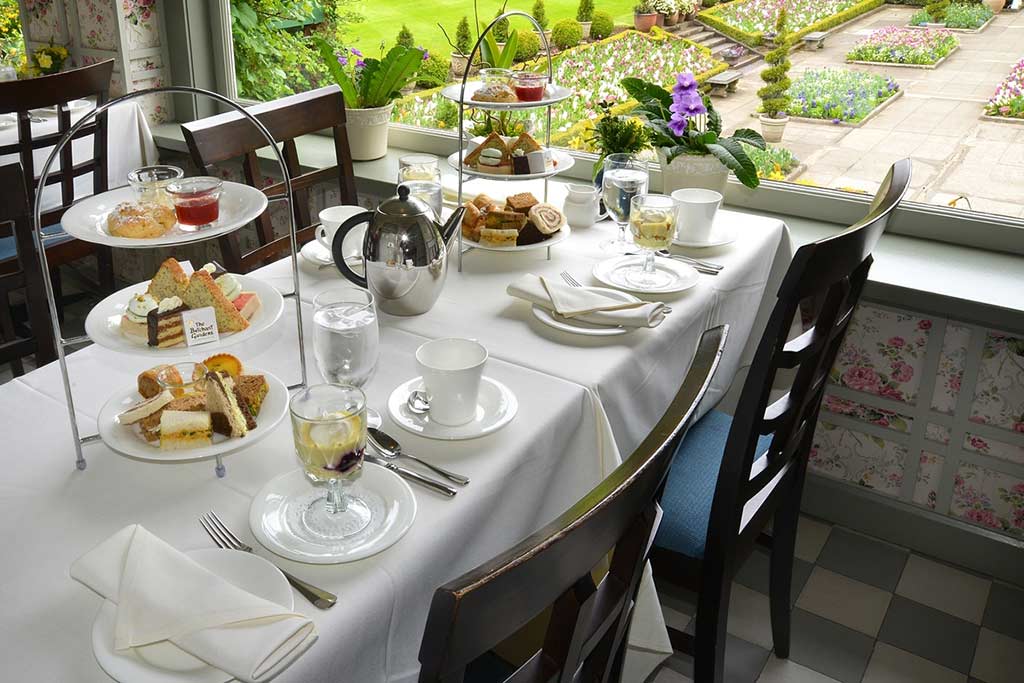 Feast on three-tiers of tasty eats while being surrounded by a variety of gorgeous blooms. Credit: The Butchart Gardens