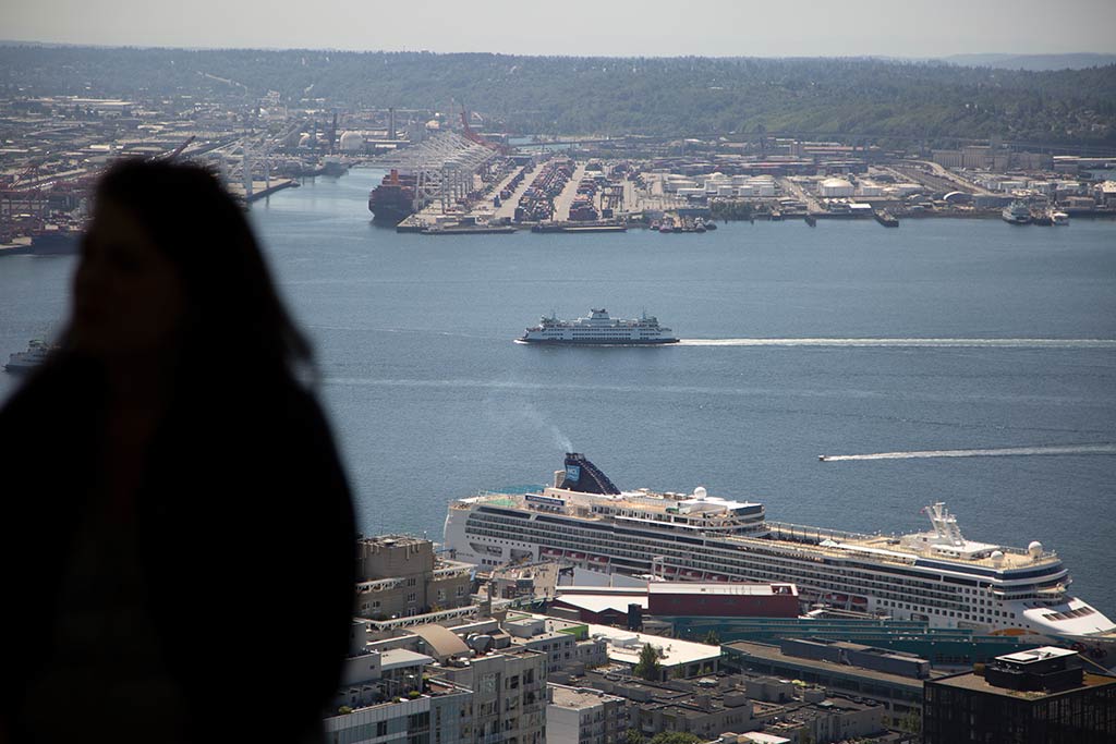 Catch sight of ferries as they glide across the Sound. Credit: John Lok and Space Needle LLC