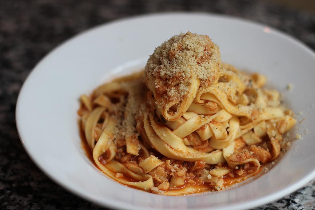 Dig into a giant pile of noodles at Il Corvo. Credit: Jameson Fink