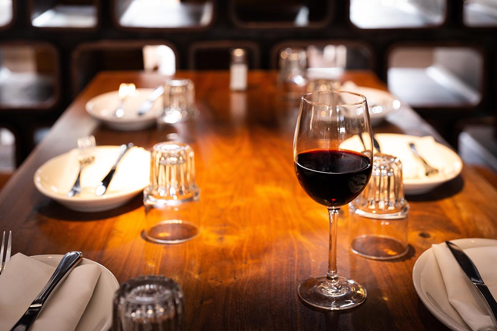 Relax with a glass of wine and tasty bites at Stage Wine Bar. Credit: Andi Whiskey