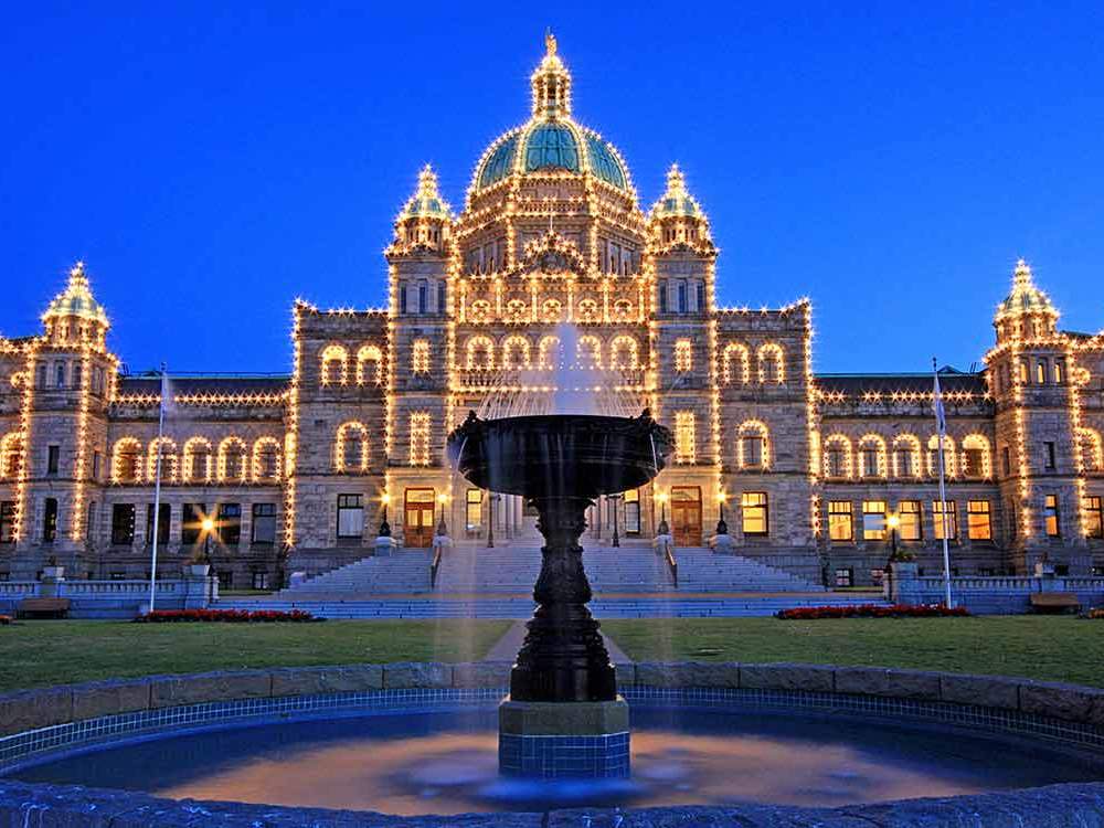 Victoria, BC's Parliament Buildings Light up the Inner Harbour.