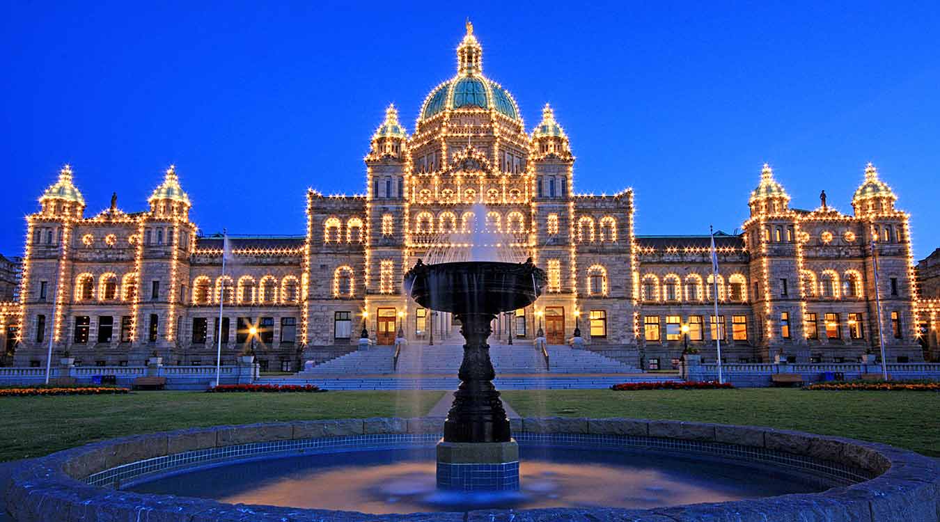 Victoria, BC's Parliament Buildings Light up the Inner Harbour.