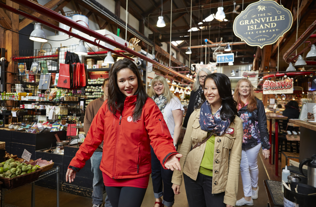 Exploring Grandville Island Public Market. Photo Courtesy of Vancouver Foodie Tours