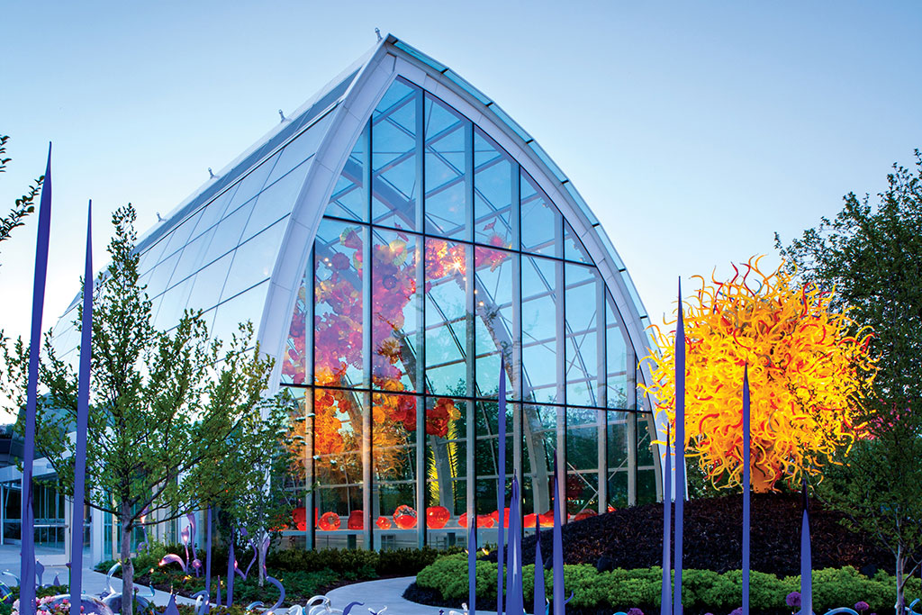 Explore an array of vibrant glass gardens at Chihuly Garden and Glass. Credit: Chihuly Garden and Glass