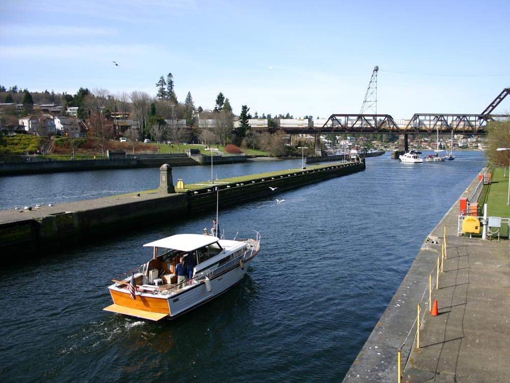 Boats cruise through the Ballard Locks.