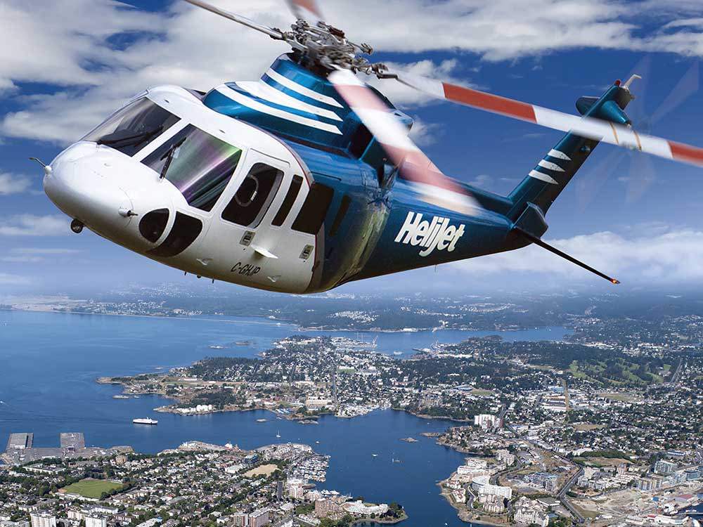 A Helijet helicopter buzzes over Vancouver.